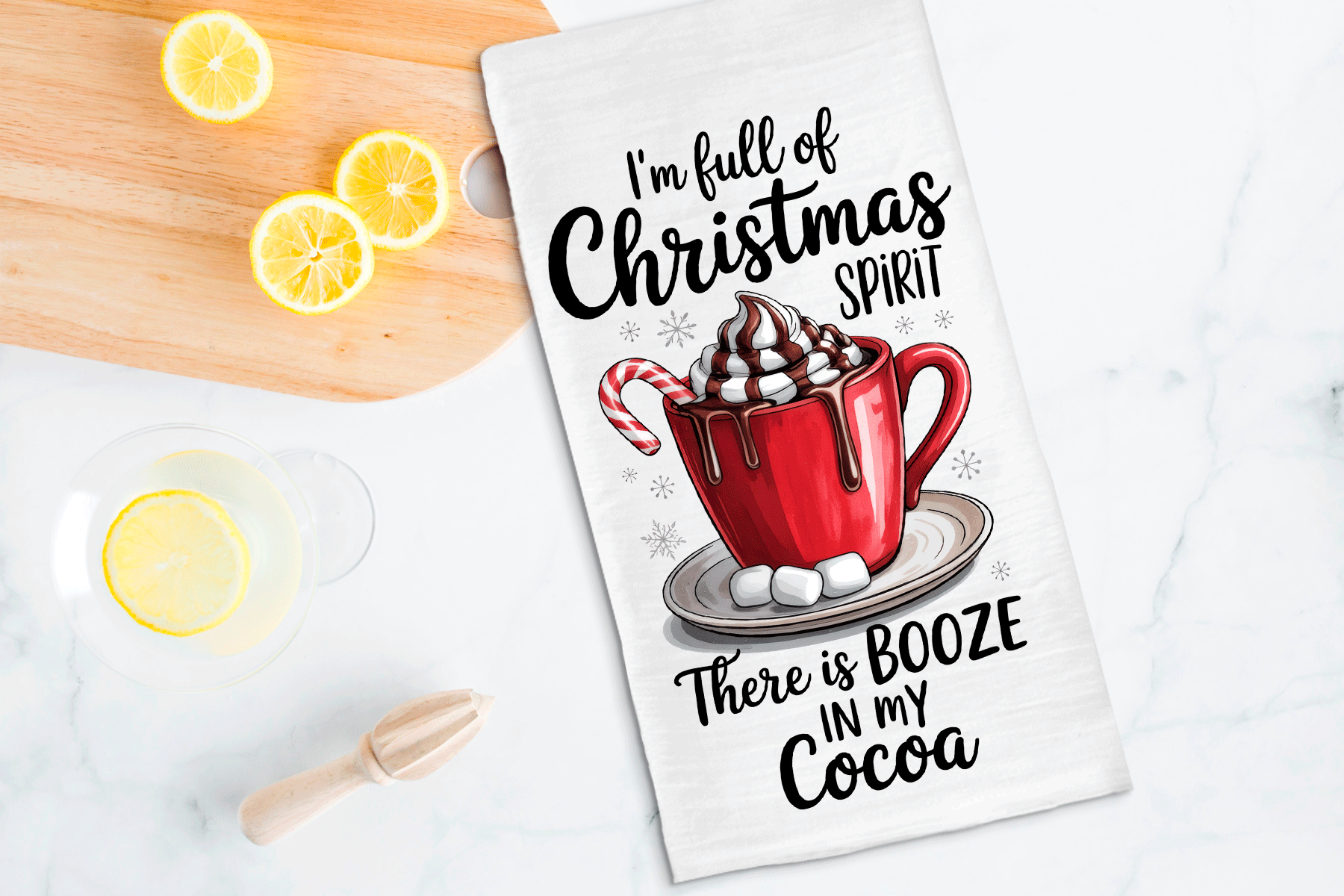 Tea towel with a festive design of hot cocoa and candy cane, text 'I'm full of Christmas spirit. There is booze in my cocoa.