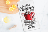 Tea towel with a festive design of hot cocoa and candy cane, text 'I'm full of Christmas spirit. There is booze in my cocoa.