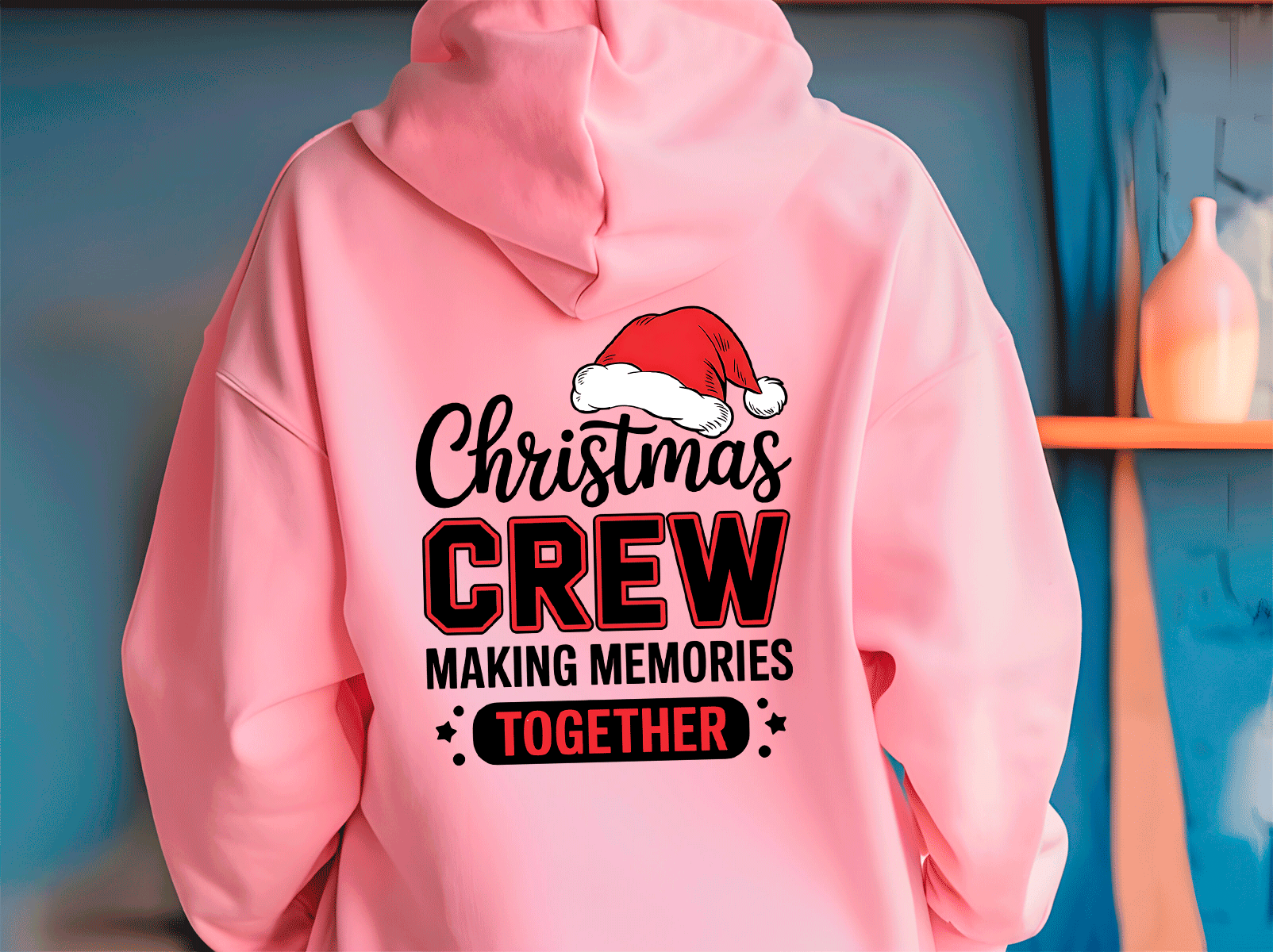 Pink hoodie with 'Christmas Crew Making Memories Together' text and Santa hat graphic.