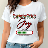 White t-shirt with 'Christmas Joy Loading Please Be Patient' text design.