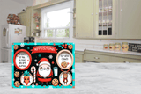 Christmas-themed cutting board  with Santa Claus and reindeer design on a kitchen floor.