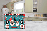 Christmas-themed cutting board  with Santa Claus and reindeer design on a kitchen floor.