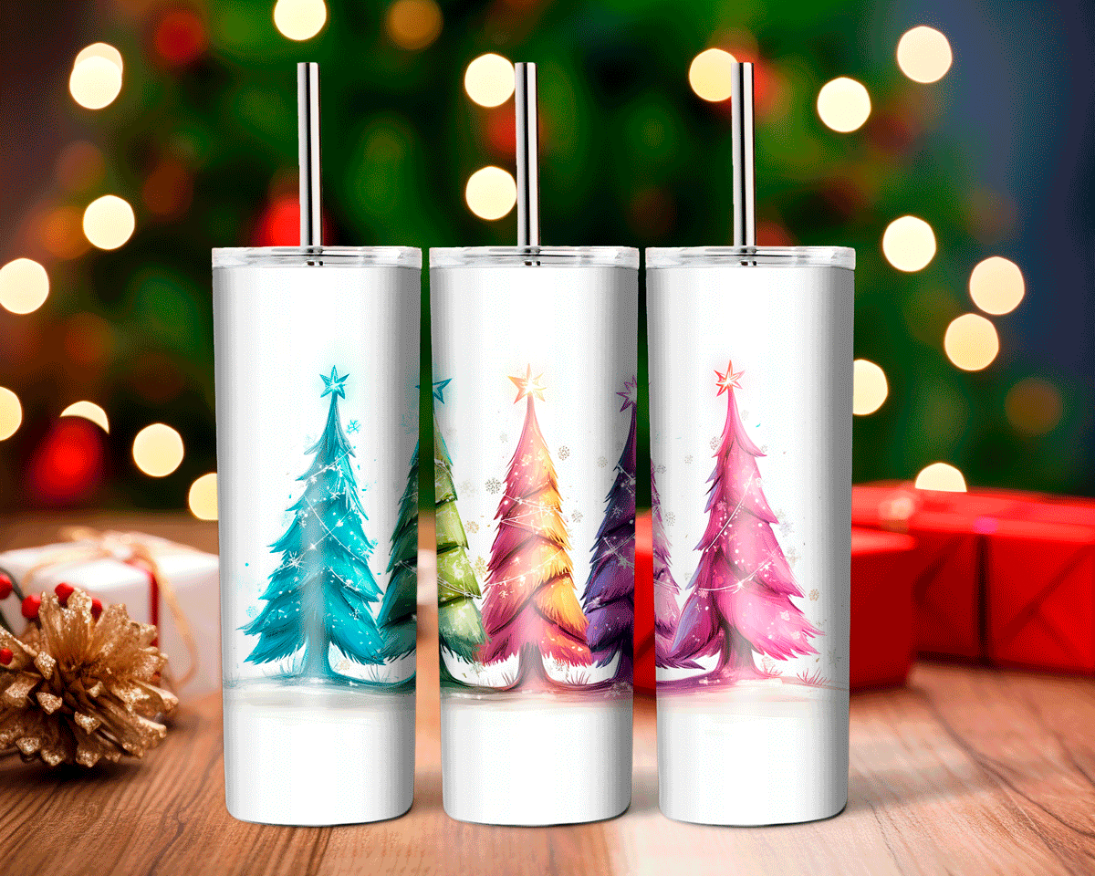 Three white tumblers with Christmas tree designs on a wooden surface with blurred lights and presents in the background.