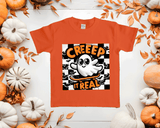 orange toddler t-shirt with halloween graphic with halloween theme background