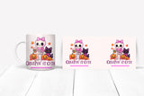 Coffee mug with a Halloween-themed design featuring a skeleton girl, black cat, and pumpkins on a white background.