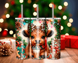 Three tumbler with a bear design and Christmas elements on a wooden surface with a blurred festive background.