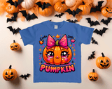 Blue toddler tshirt with pumpkin graphic against an halloween theme background