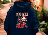 Navy blue hoodie with Christmas-themed design and text on the back