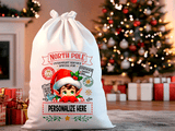 Decorative Santa sack with Christmas-themed design in a festive room with a tree and presents.