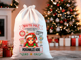 Personalized Santa sack with elf design in a festive room with Christmas tree and presents.