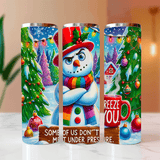 Three Christmas-themed tumblers with a snowman and festive designs on a neutral background.