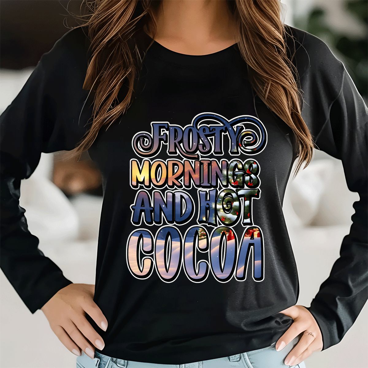 Black sweatshirt with colorful text 'Frosty mornings and hot cocoa' worn by a person.