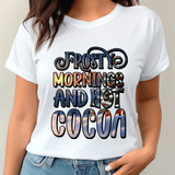 White t-shirt with colorful text 'Frosty Morning and Hot Cocoa' worn by a person.