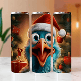 Three tumbler designs featuring a blue bird character with a Santa hat against a Christmas tree and gift background.