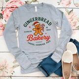 Gray long-sleeve shirt with gingerbread bakery design on a floral background