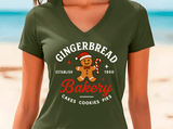 Green t-shirt with gingerbread man design on a beach background