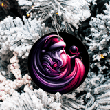 Decorative ornament with a pink and purple design hanging on a snow-covered tree.