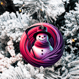 Colorful snowman ornament hanging on a tree
