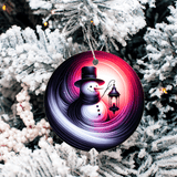 Decorative Christmas ornament with a snowman design on a tree