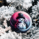 Colorful snowman ornament on a snow-covered tree