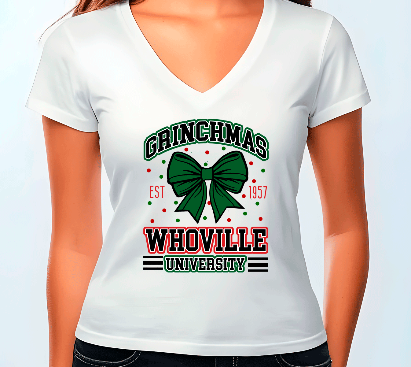 White t-shirt with 'Grinchmas Whoville University' design on a white background