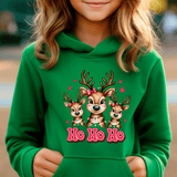 Child wearing a green hoodie with reindeer design and 'Ho Ho Ho' text.