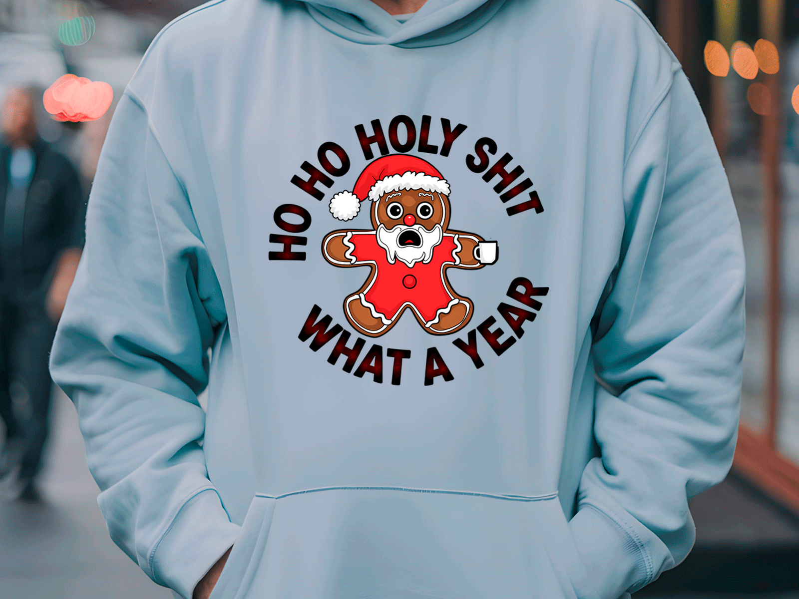 Light blue hoodie with a gingerbread man graphic and text in an urban setting