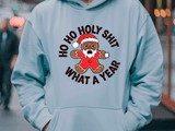 Light blue hoodie with a gingerbread man graphic and text in an urban setting