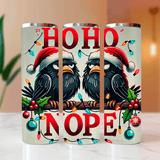 Three Christmas-themed tumblers with birds wearing Santa hats and festive decorations.
