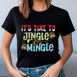 Person wearing a black t-shirt with festive text and graphics.