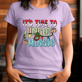 Person wearing a purple t-shirt with festive text and graphics.