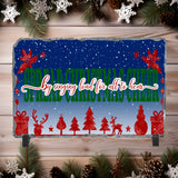 Decorative Christmas sign with festive designs and text on a wooden background.