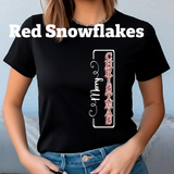 Person wearing a black t-shirt with 'Merry Christmas' design.