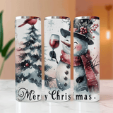 Three Christmas-themed tumblers with snowman, wine glass, and tree designs on a blurred background.
