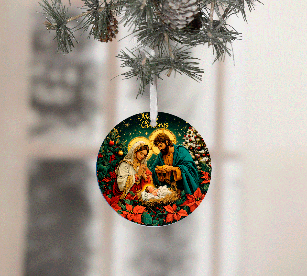 Christmas ornament with nativity scene design hanging on a tree.