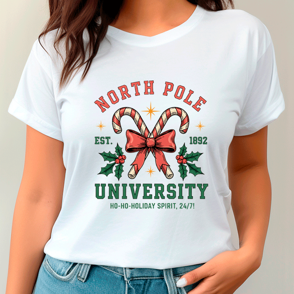 White t-shirt with 'North Pole University' design featuring candy canes and a bow.