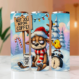 Three Christmas-themed tumblers with cartoon characters and festive designs.