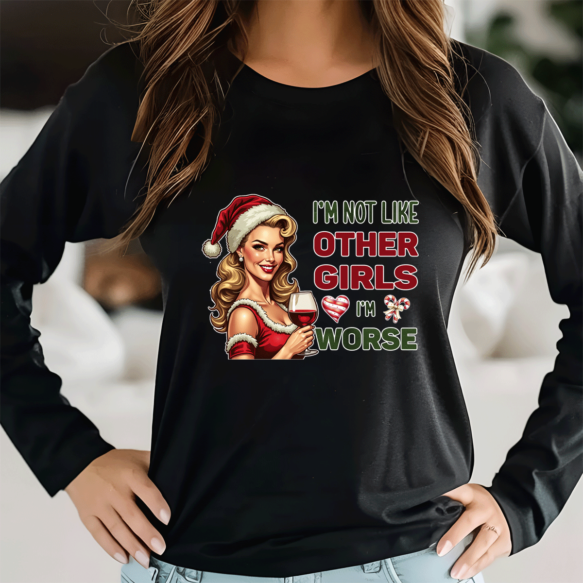 Black sweatshirt with a graphic of a woman in a Santa hat holding a wine glass and text 'I'm not like other girls, I'm worse'.