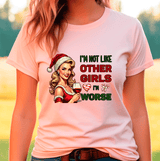Person wearing a pink t-shirt with a graphic design and text.