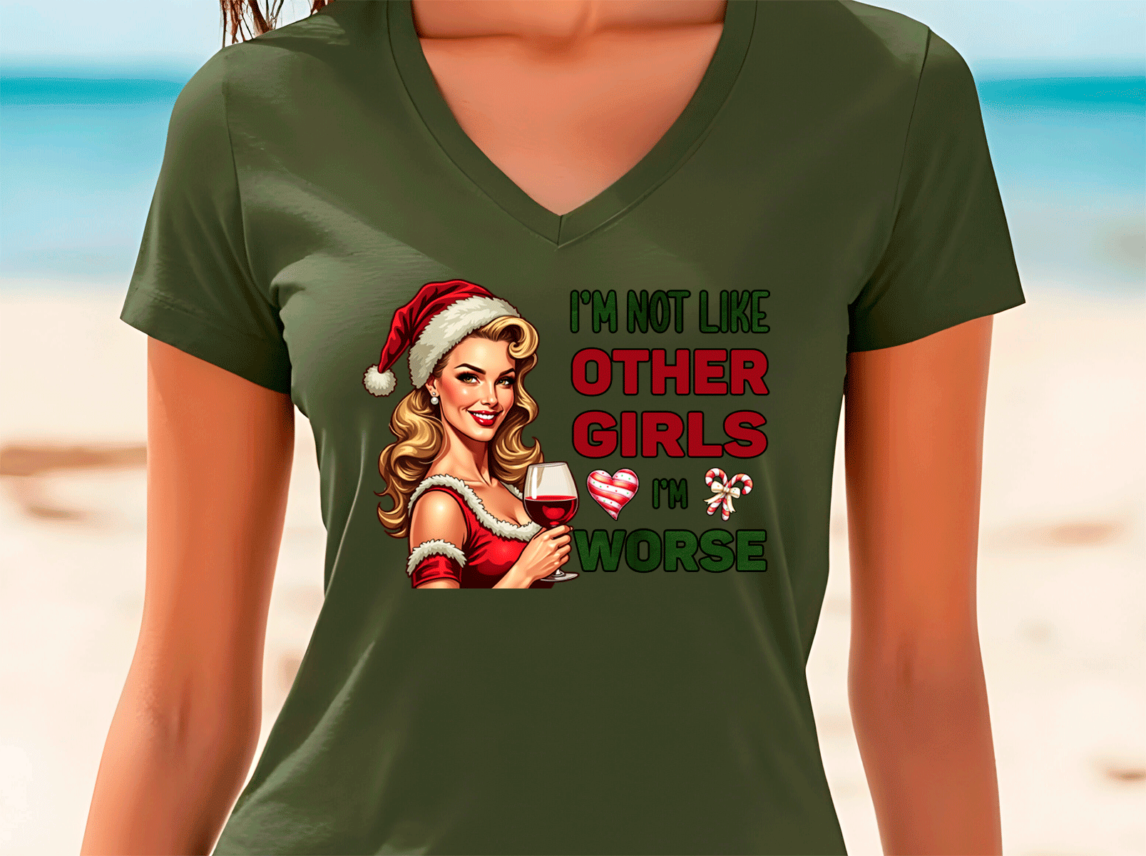 Green t-shirt with a graphic of a woman in a Santa hat and text on a beach background
