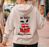 Person wearing a hoodie with a Christmas-themed graphic and text.