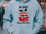 Light blue hoodie with a graphic of Santa Claus falling into a chimney and text 'OH SHIT! Merry Christmas' on a blurred street background.