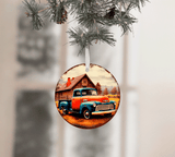 Decorative Christmas ornament with a vintage truck design hanging on a tree.