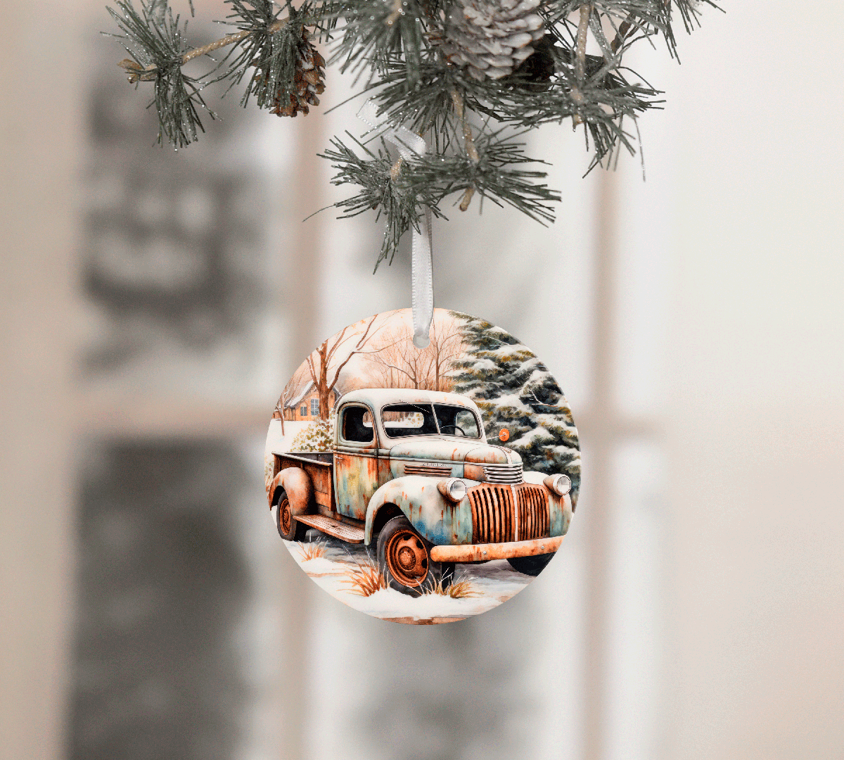 Decorative Christmas ornament with vintage truck design hanging on a tree.