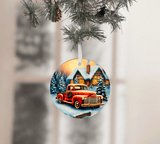 Christmas ornament with a red truck and snowy cabin design, hanging from a tree.
