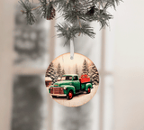 Decorative Christmas ornament with a vintage truck and pine trees on a wooden background, hanging from a tree.
