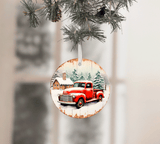Round Christmas ornament with a red truck and cabin design, hanging from a tree.