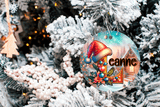 Decorative Christmas ornament with a colorful design hanging on a tree.