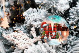 Decorative ornament with 'William' on a Christmas tree