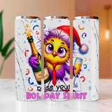 Three colorful tumblers with festive designs and text on a blurred background